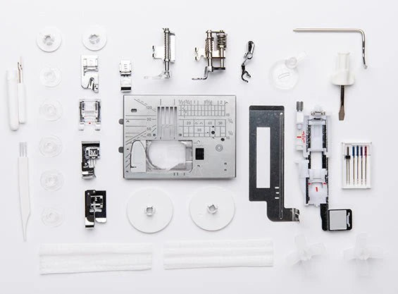 Janome Memory Craft 6650 Sewing Machine with Bonus Quilting Bundle